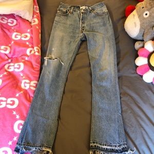 Re/Done distressed jeans with boot cut at ankles